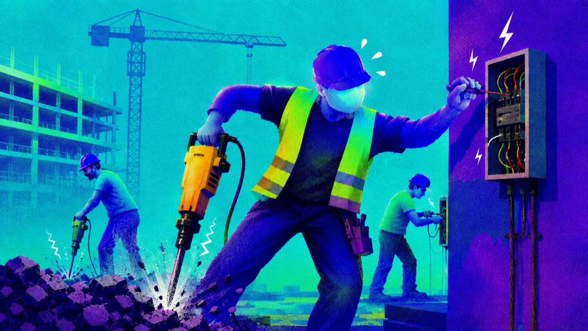 A construction worker operating a jackhammer while two other workers handle separate tasks